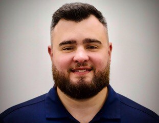 Staff member Dan Fry from 7443624930a8