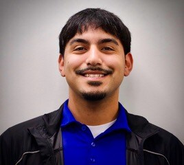 Staff member Justin Briones from 8f7450e92374