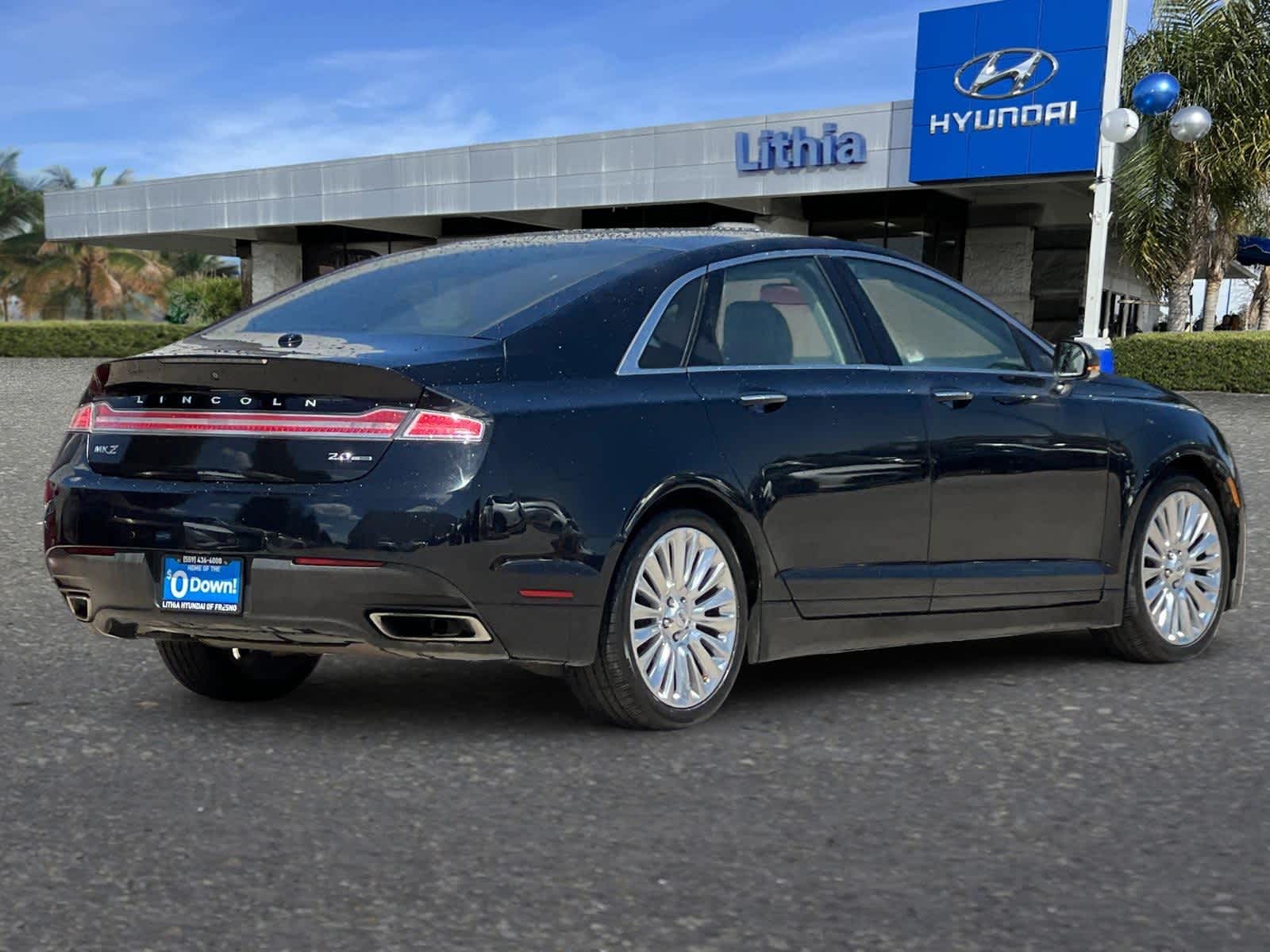 Used 2016 Lincoln MKZ Base with VIN 3LN6L2G98GR605309 for sale in Fresno, CA