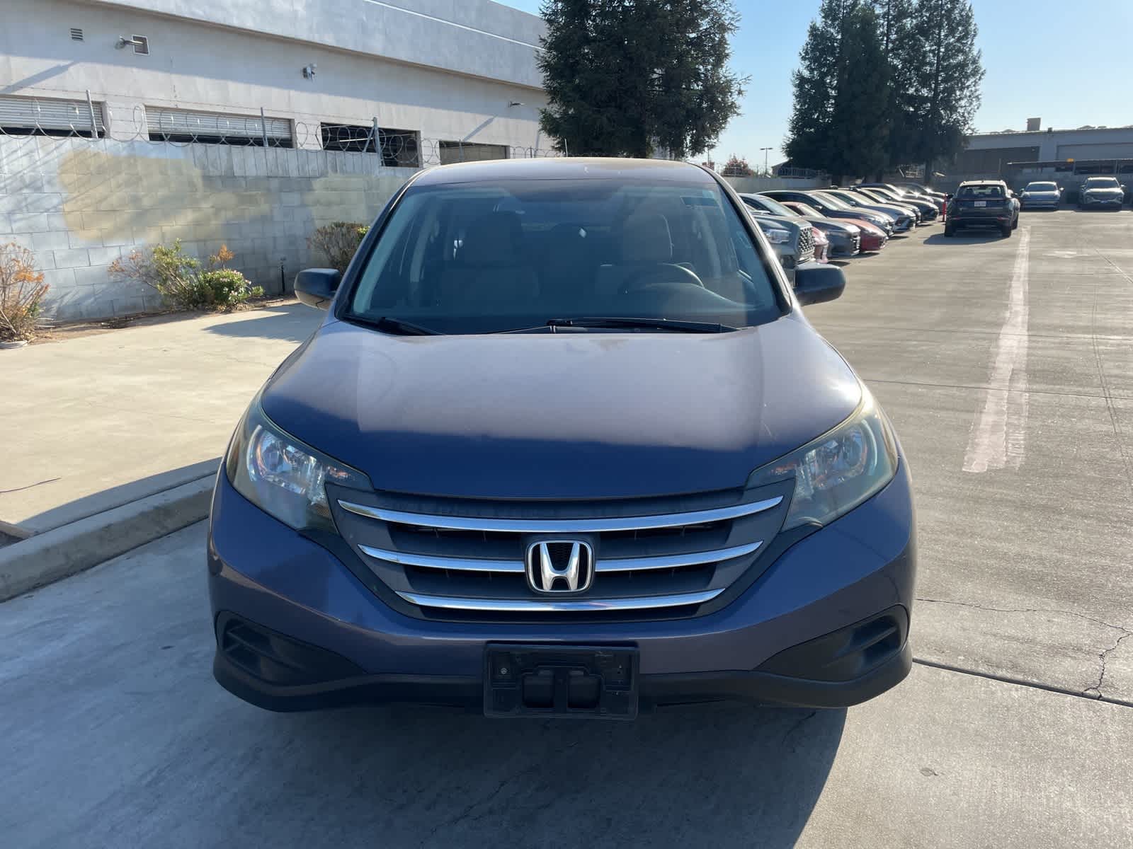 Used 2013 Honda CR-V LX with VIN 3CZRM3H36DG704694 for sale in Fresno, CA