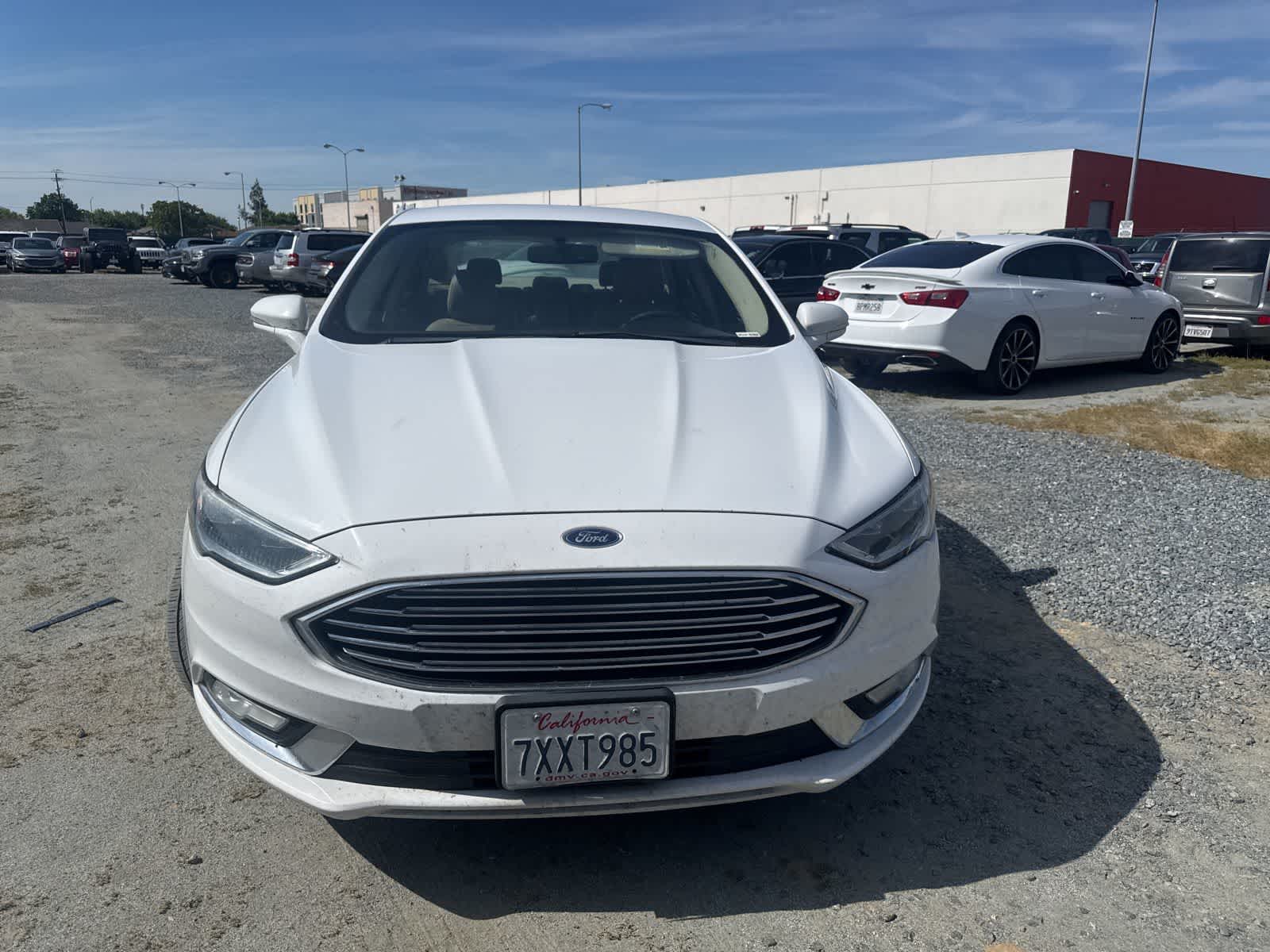 Used 2017 Ford Fusion Energi SE Luxury with VIN 3FA6P0PU2HR299734 for sale in Fresno, CA
