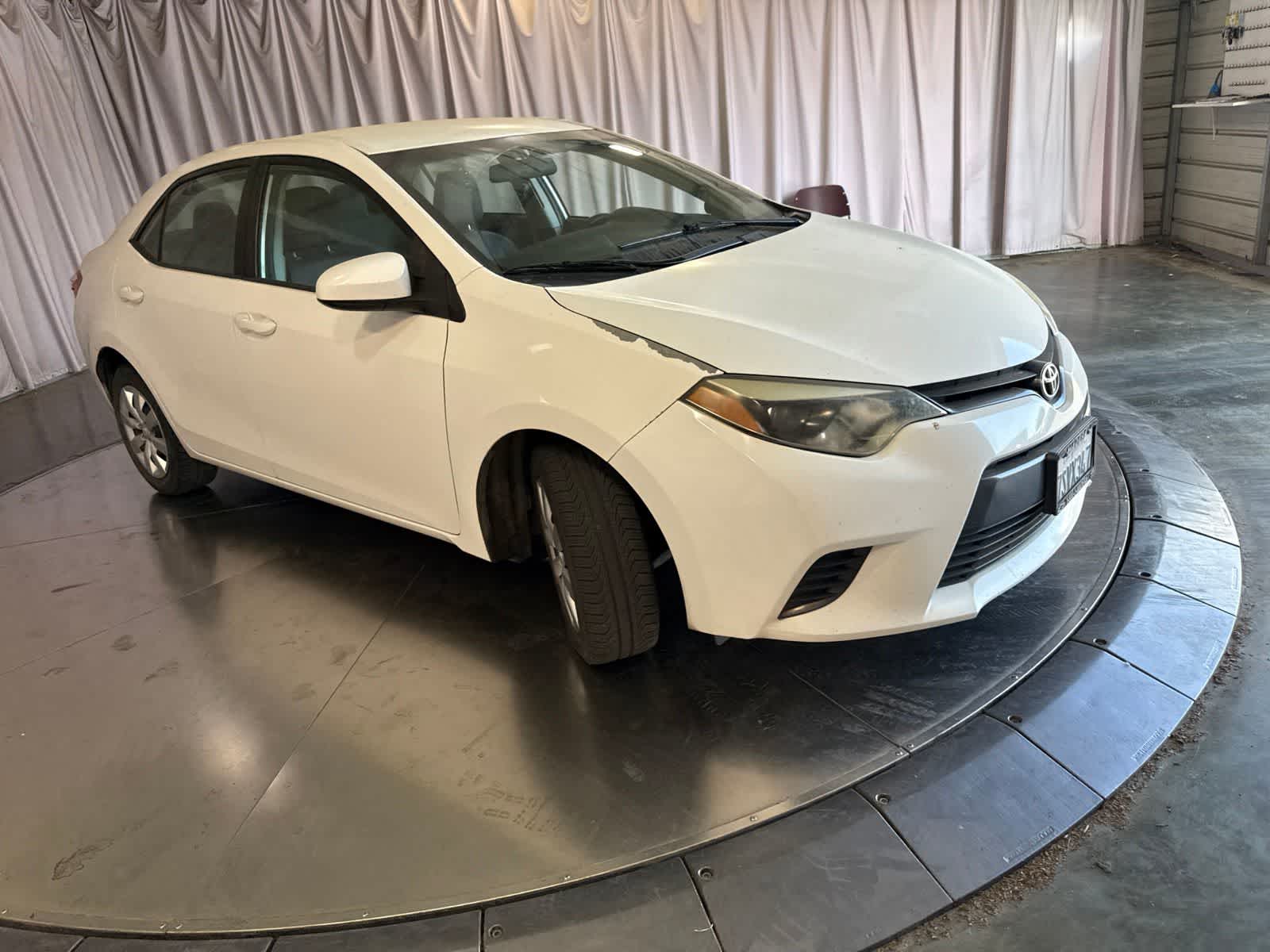 Used 2016 Toyota Corolla LE with VIN 5YFBURHE6GP557996 for sale in Fresno, CA