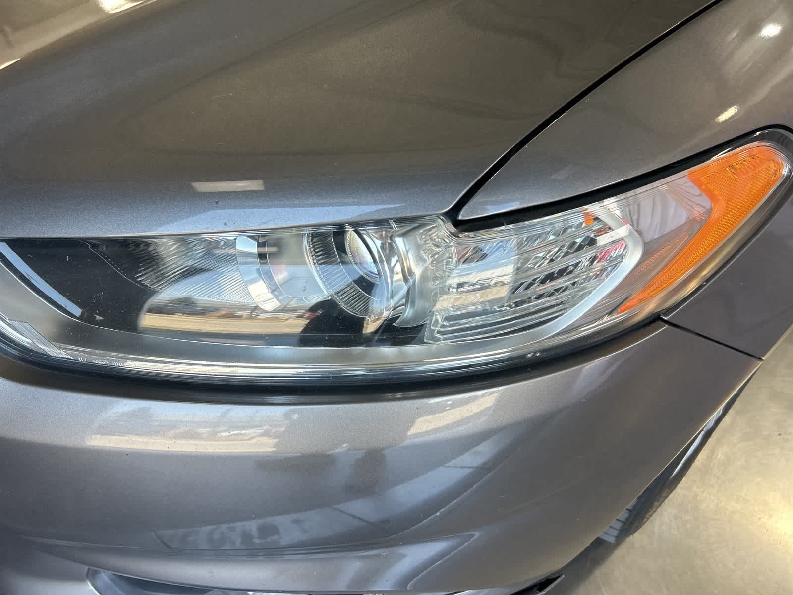 Used 2014 Ford Fusion SE Hybrid with VIN 3FA6P0LU1ER142214 for sale in Fresno, CA