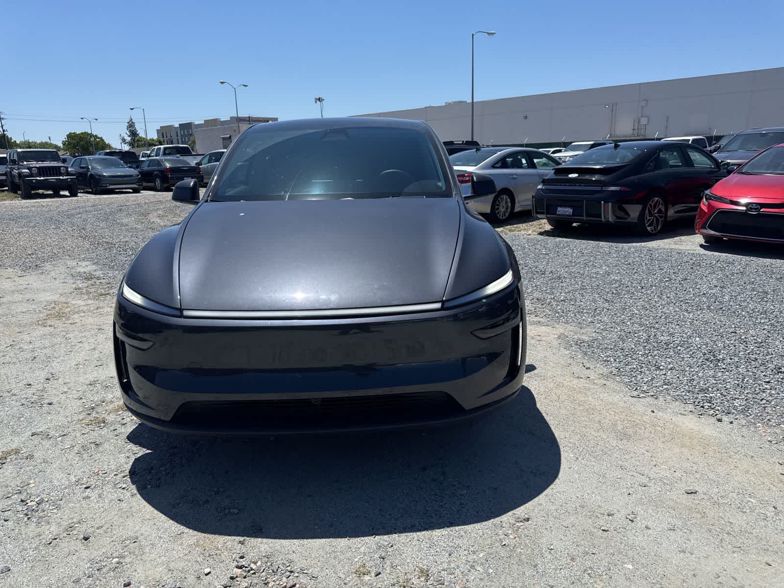 Used 2026 Tesla Model Y Standard with VIN 7SAYGDED8TF447153 for sale in Fresno, CA