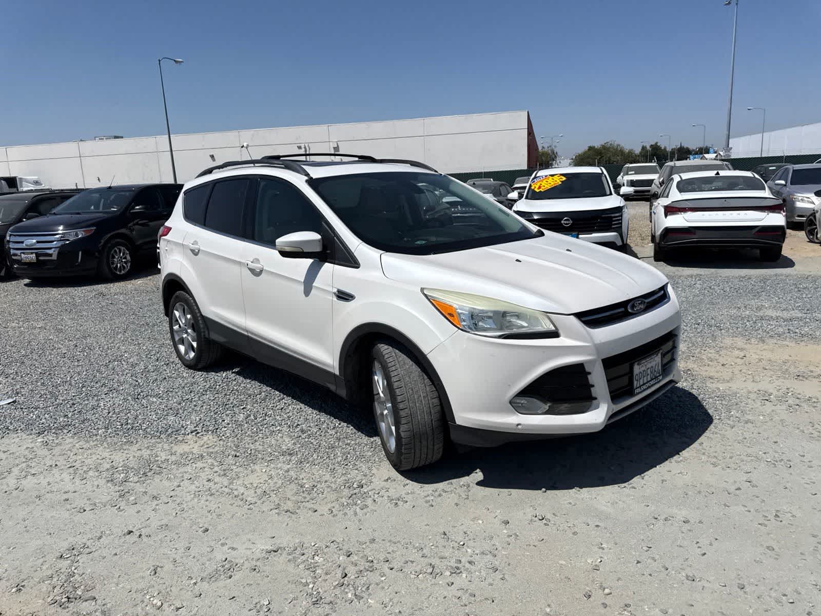 Used 2013 Ford Escape SEL with VIN 1FMCU0HX8DUC98732 for sale in Fresno, CA