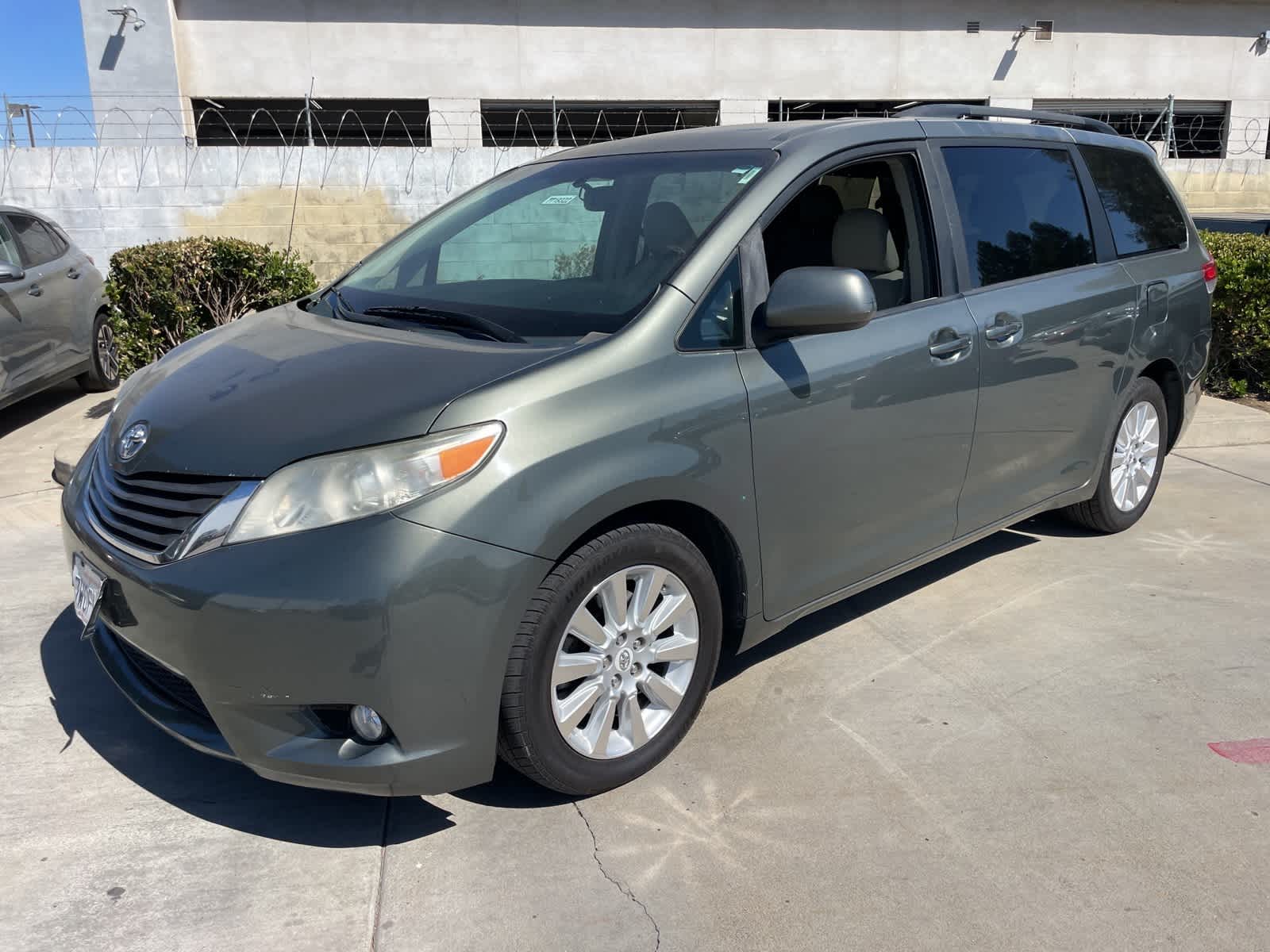 Used 2011 Toyota Sienna XLE with VIN 5TDDK3DC5BS007611 for sale in Fresno, CA