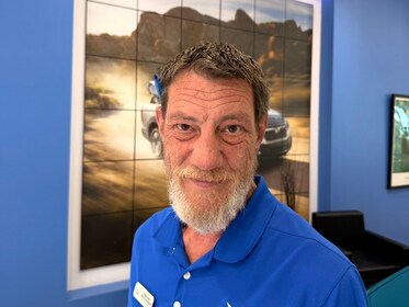 Staff member Gregory Fine from ID_247504