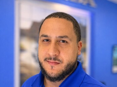 Staff member Joel Vargas Rios from ID_247504