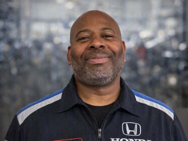 Staff member Clive Leslie from ID_247504