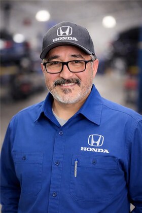 Staff member Jose Rivera from ID_247504