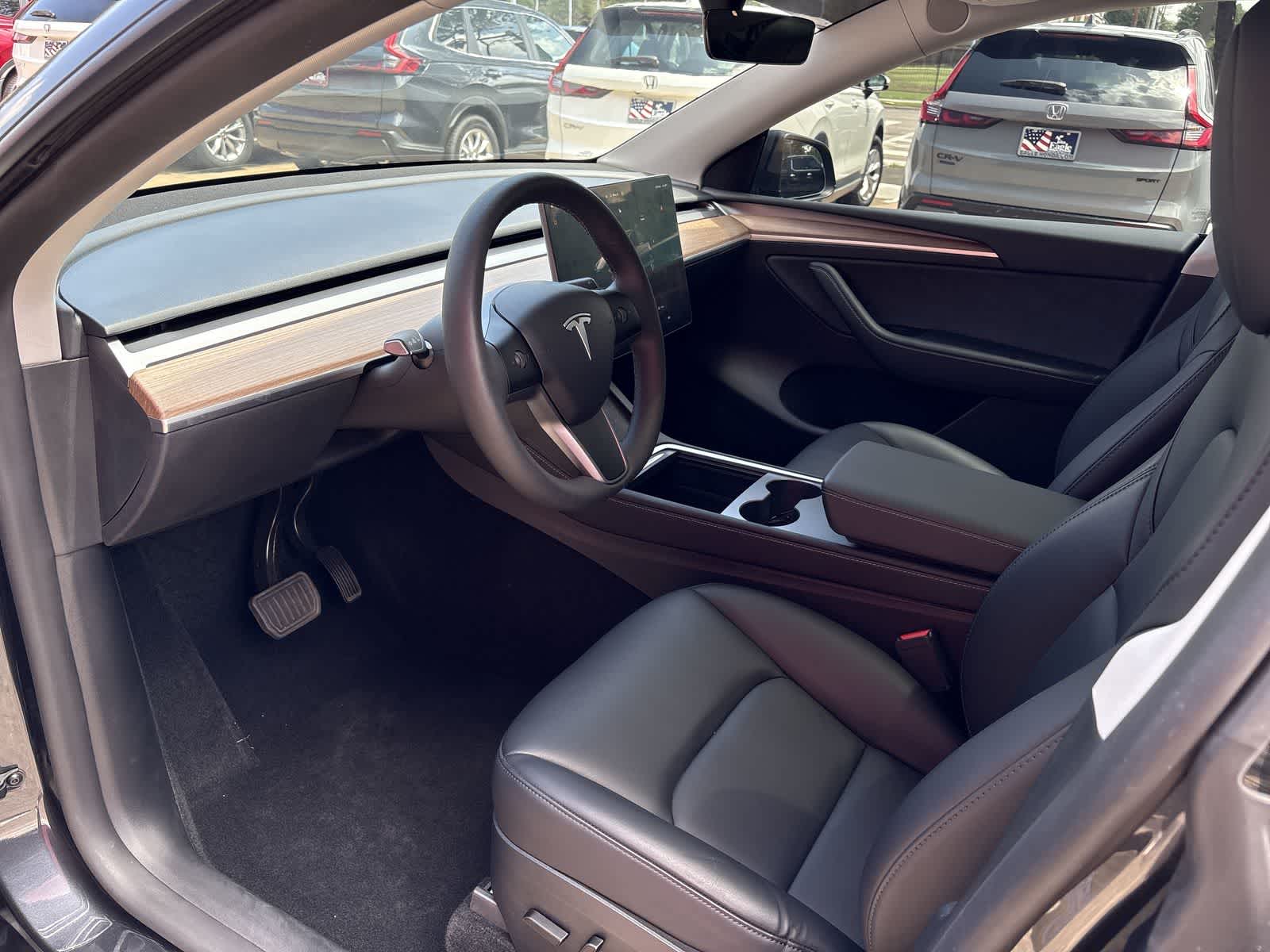 Used 2024 Tesla Model Y Long Range with VIN 7SAYGDED2RF055665 for sale in Northfield, Minnesota