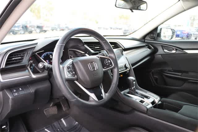 Used 2021 Honda Civic EX with VIN 19XFC1F39ME002061 for sale in Houston, TX