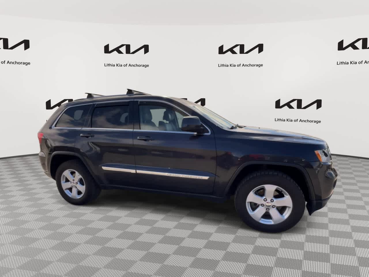 Used 2012 Jeep Grand Cherokee Laredo with VIN 1C4RJFAGXCC287434 for sale in Anchorage, AK