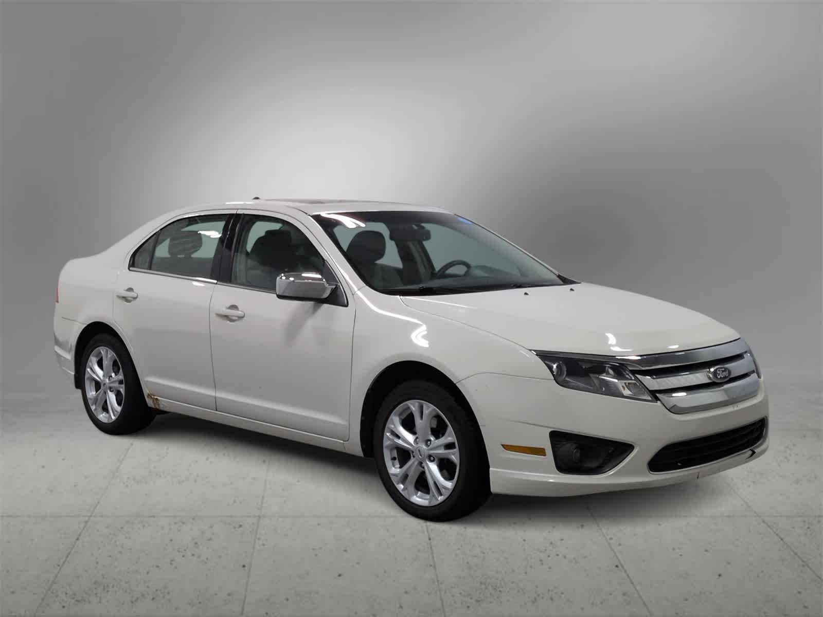 Used 2012 Ford Fusion SE with VIN 3FAHP0HA7CR162388 for sale in Farmington Hills, MI