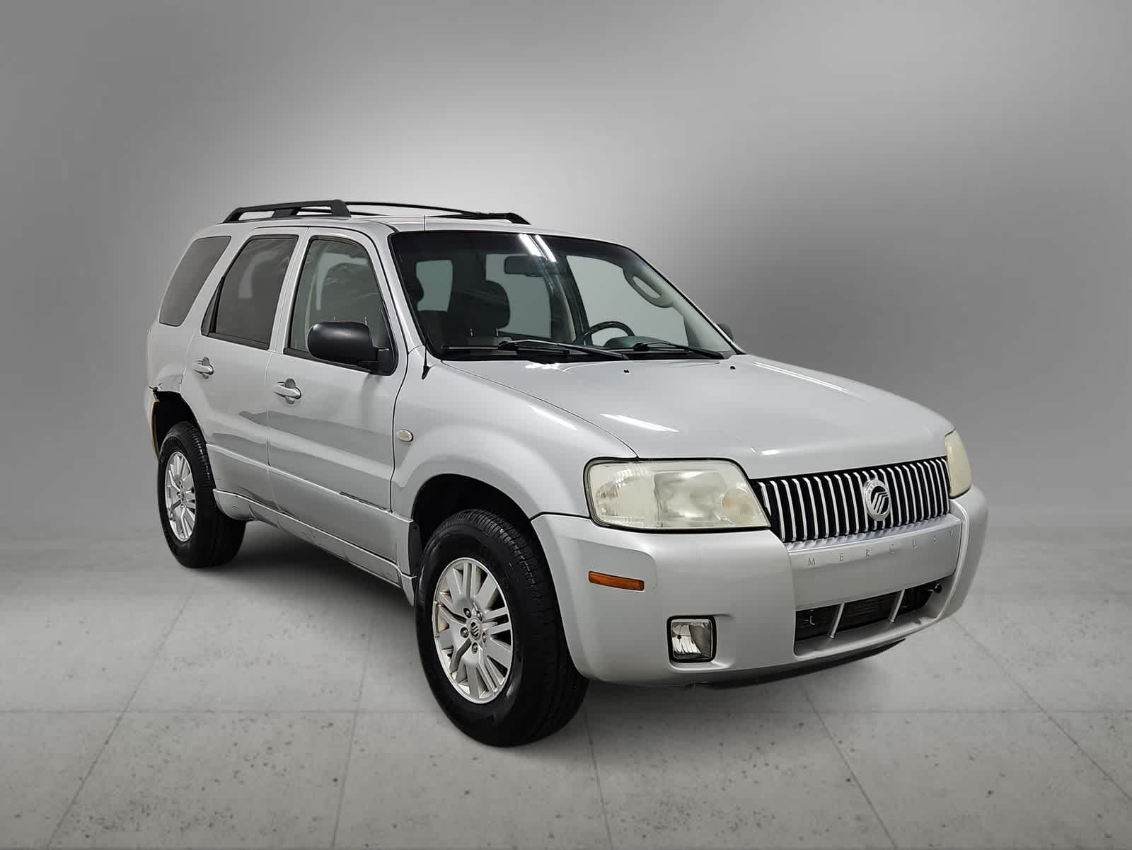 Used 2006 Mercury Mariner Premier 4WD with VIN 4M2YU57106KJ05745 for sale in Farmington Hills, MI