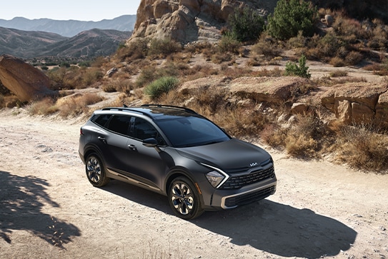 grey Kia Sportage Plug-in Hybrid parked near Vasquez rocks