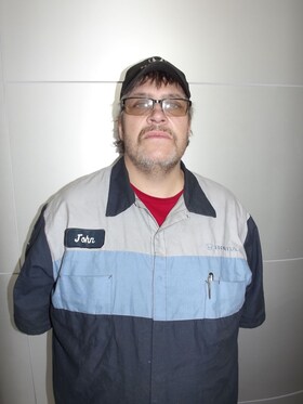 Staff member John Pulver from ID_057b60fd4ac9