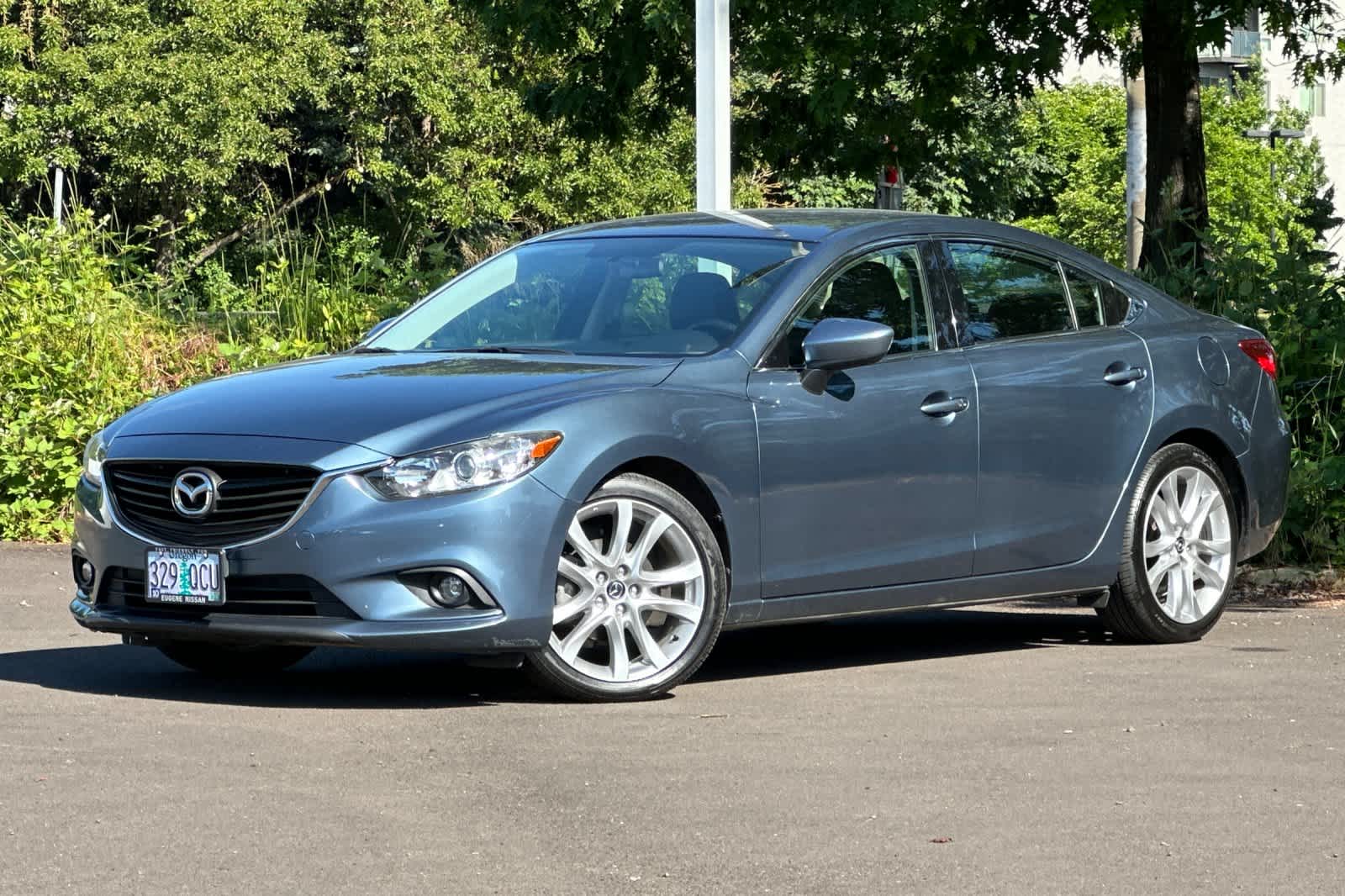 2015 Mazda EZ-6 i Touring Auto's photo