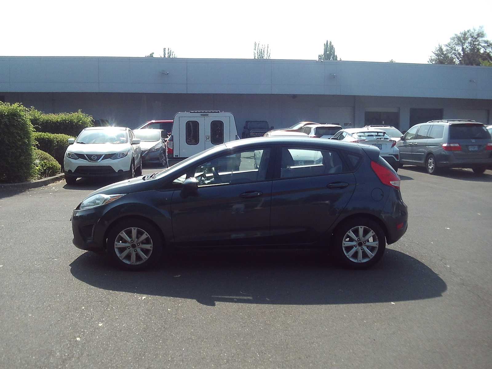 Used 2011 Ford Fiesta SE with VIN 3FADP4EJ9BM174273 for sale in Eugene, OR