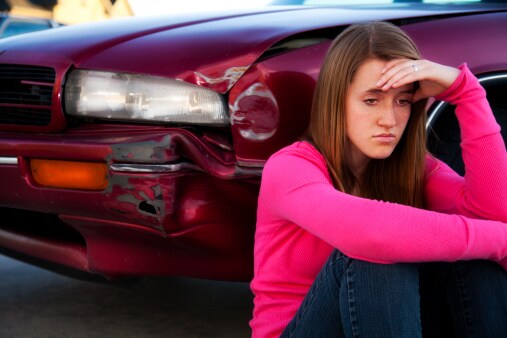 Woman worries over dent in car