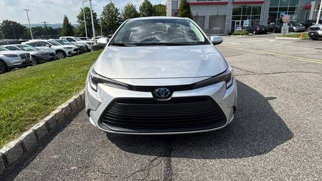 Used 2023 Toyota Corolla LE with VIN JTDBCMFE7P3023228 for sale in Northfield, Minnesota