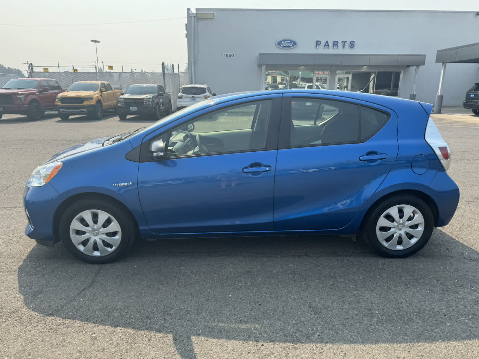 Used 2014 Toyota Prius c Two with VIN JTDKDTB33E1568329 for sale in Roseburg, OR