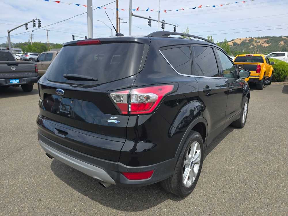 Used 2017 Ford Escape SE with VIN 1FMCU9GD9HUE80683 for sale in Roseburg, OR