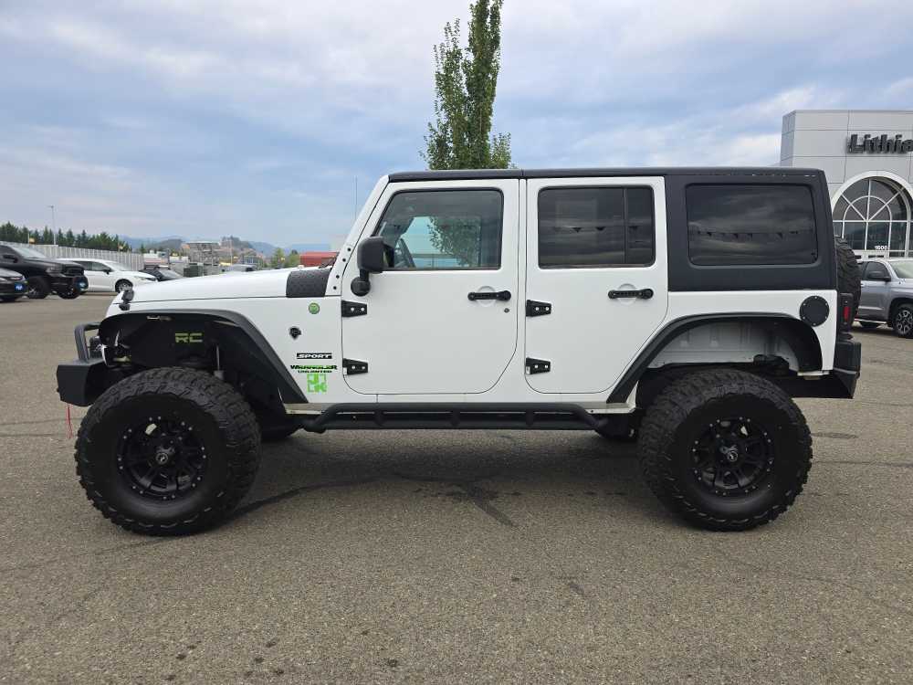 2013 Jeep Wrangler Unlimited Sport photo 2