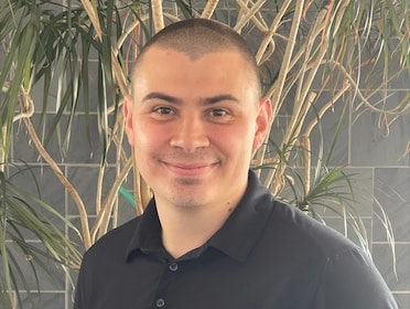 Staff member Devin Lenzi from ID_ee0d758c0177