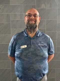 Staff member Jim Hampton from ID_a1fc9131a528