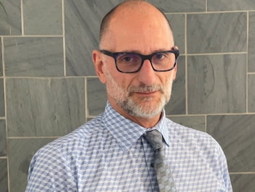 Staff member David Meltzer from ID_50d44bd4fa85