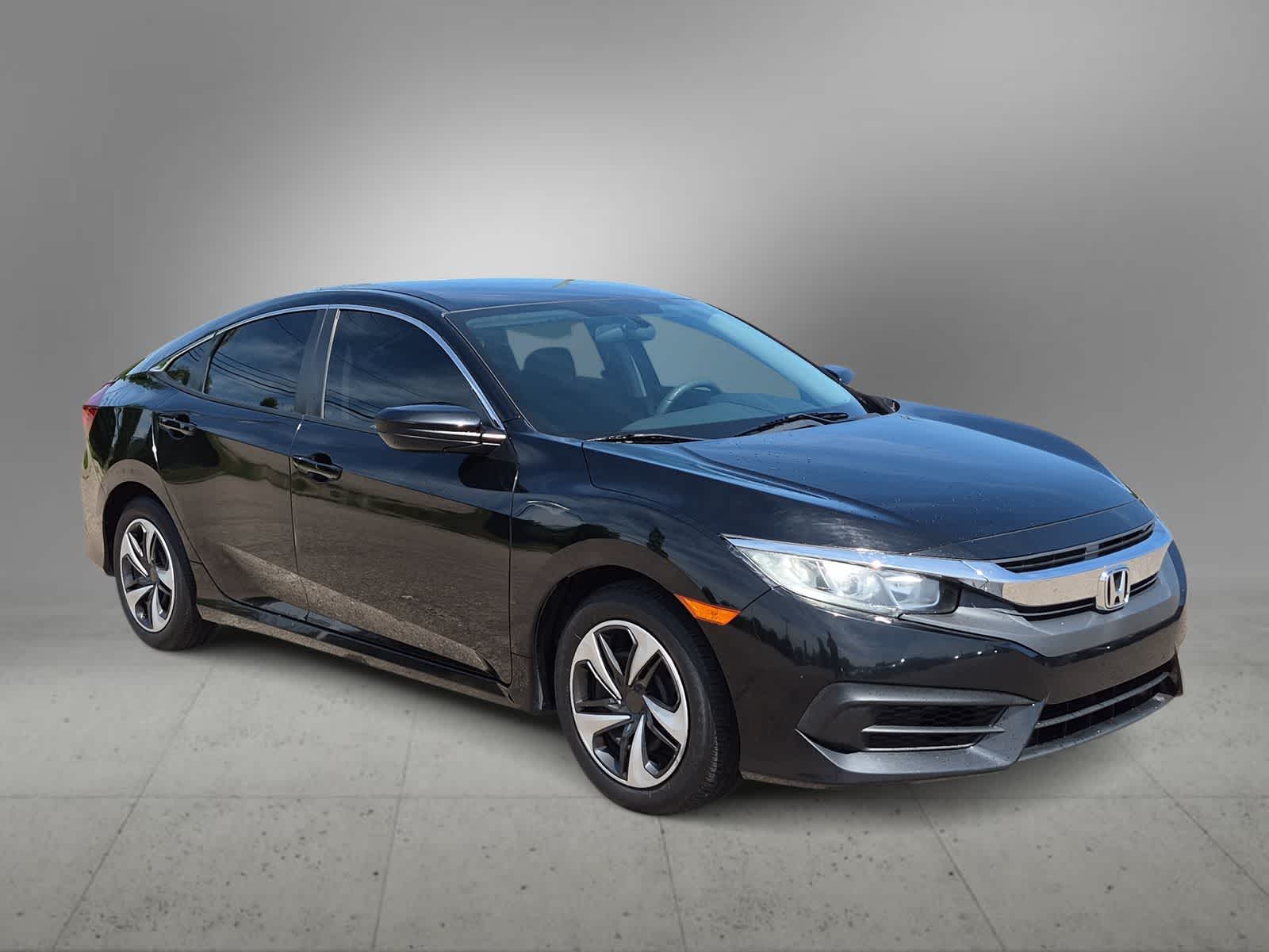 Used 2016 Honda Civic LX with VIN 19XFC2F59GE056004 for sale in Farmington, MI