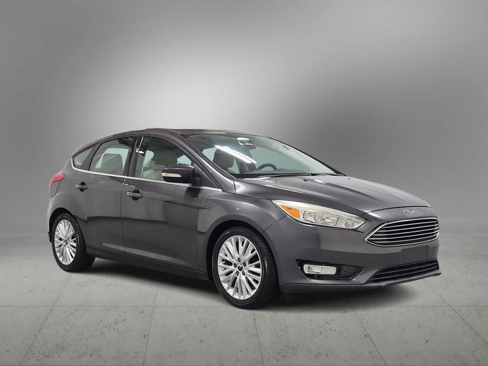Used 2016 Ford Focus Titanium with VIN 1FADP3N24GL295398 for sale in Farmington, MI