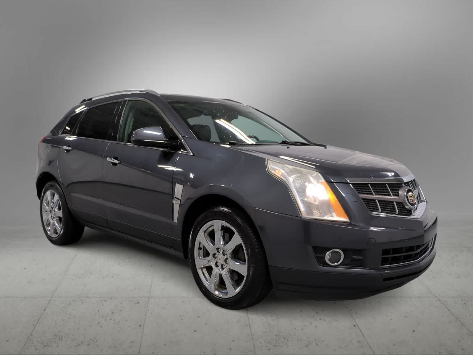 Used 2012 Cadillac SRX Performance Collection with VIN 3GYFNBE36CS604296 for sale in Farmington, MI