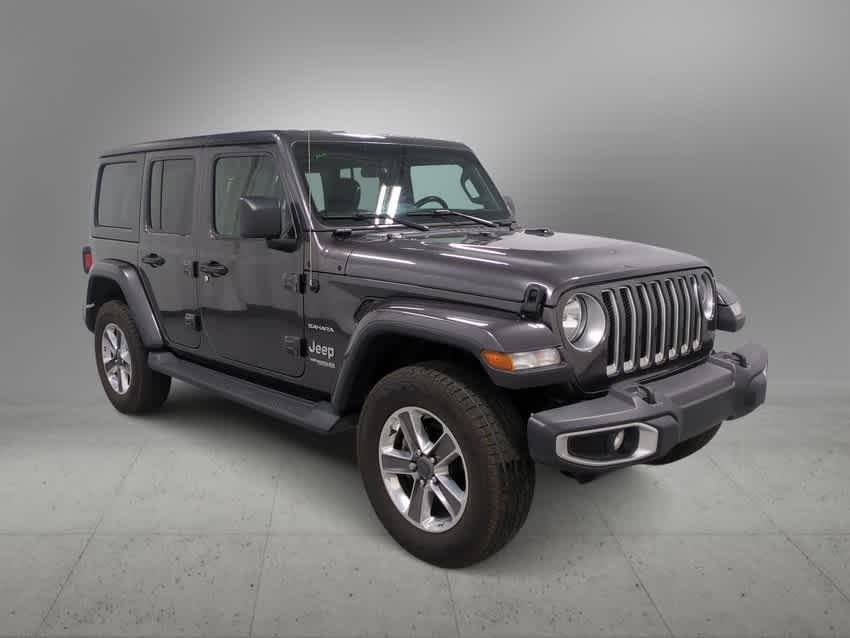 Used 2021 Jeep Wrangler Unlimited Sahara with VIN 1C4HJXENXMW821042 for sale in Farmington, MI