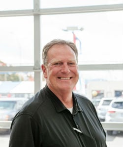 Staff member Scott Weigand from ID_5575a25021e0