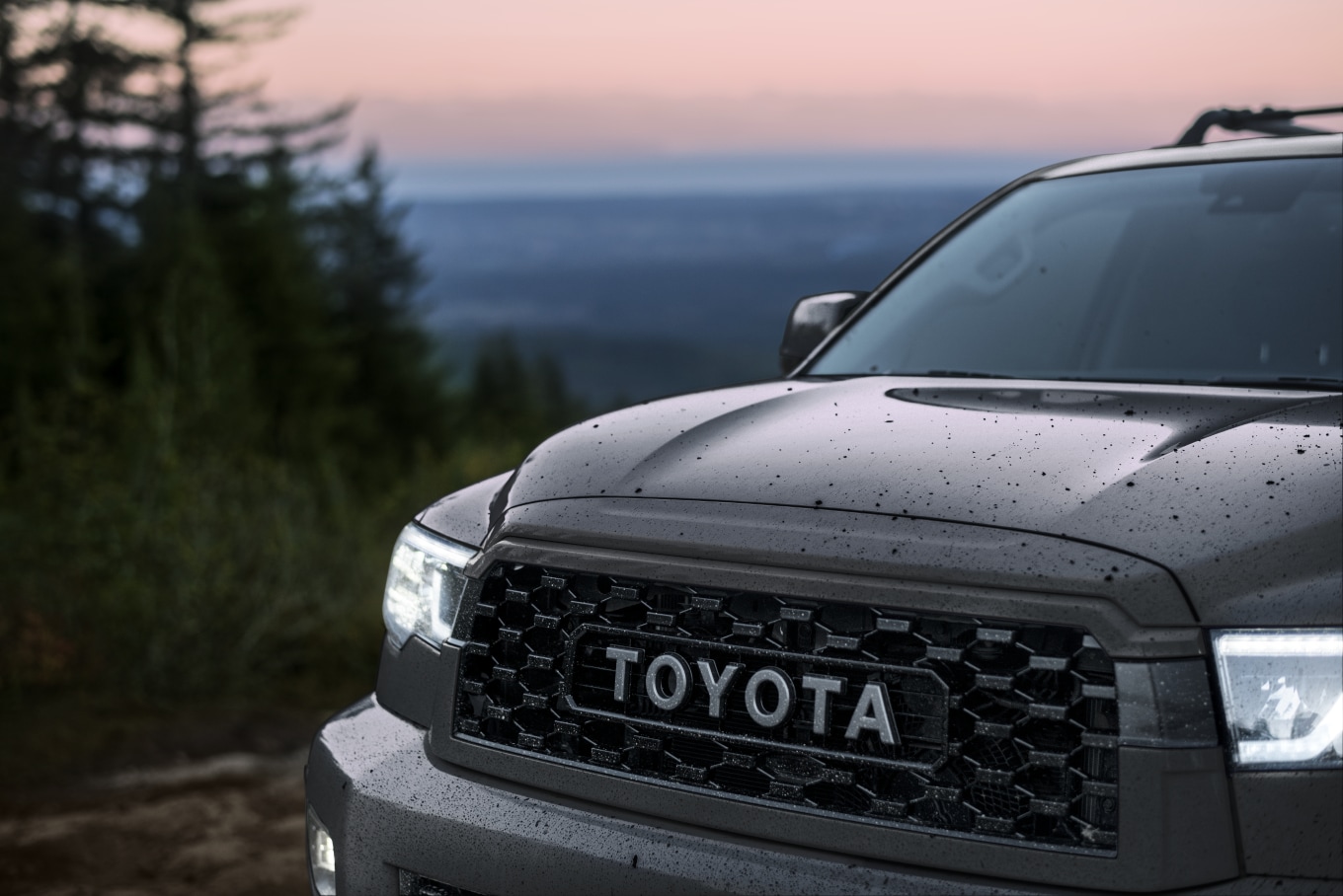 dark gray Toyota Sequoia parked at sunset