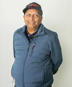 Staff member Norman Prasad from ID_35eeddbfc632