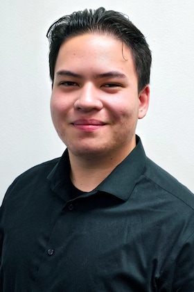 Staff member Auggie A. from 20254b44317d