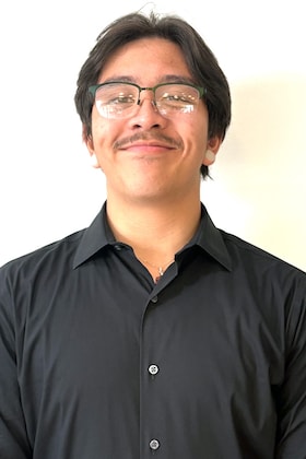 Staff member Zack E. from 20254b44317d