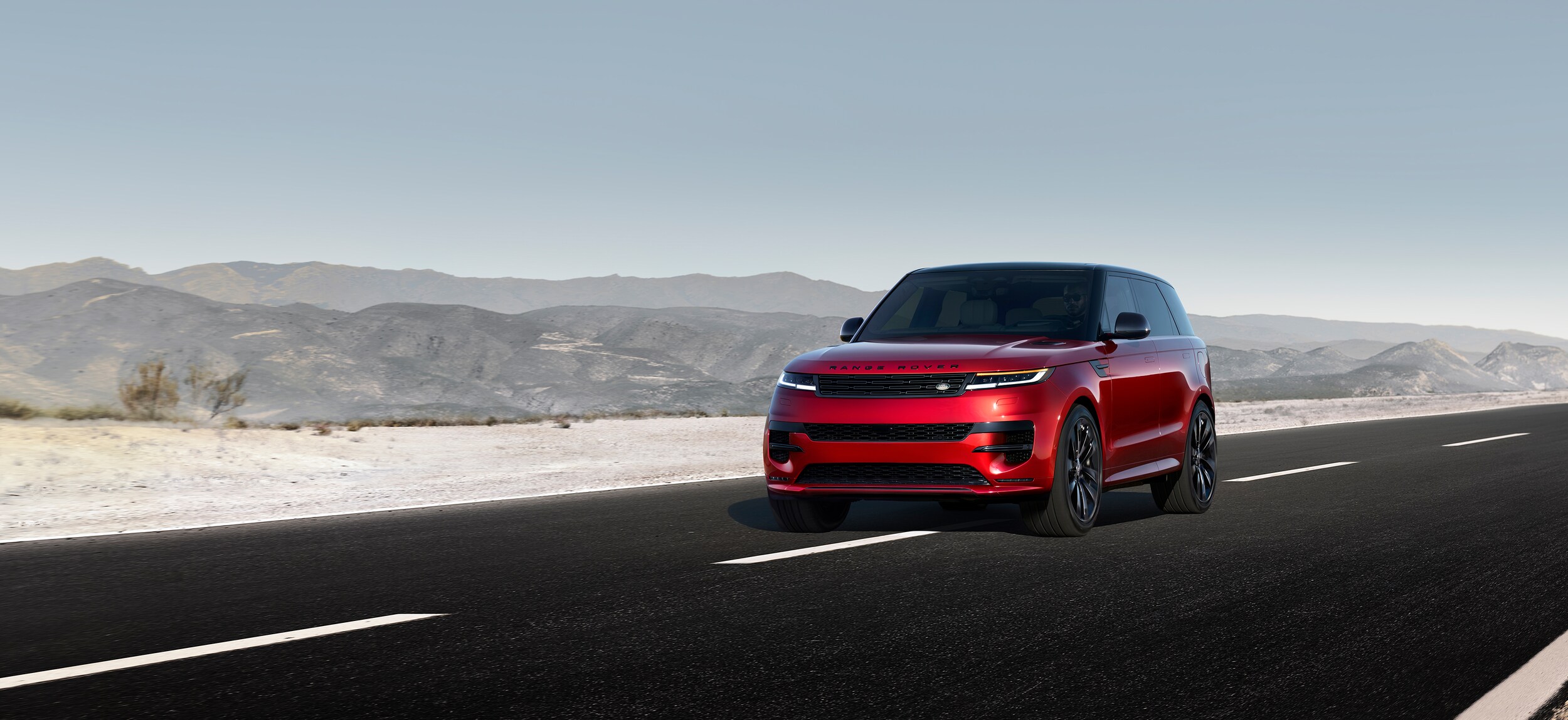 Range Rover driving on open road