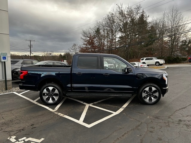 Used 2023 Ford F-150 Lightning Platinum with VIN 1FT6W1EVXPWG27699 for sale in Londonderry, NH