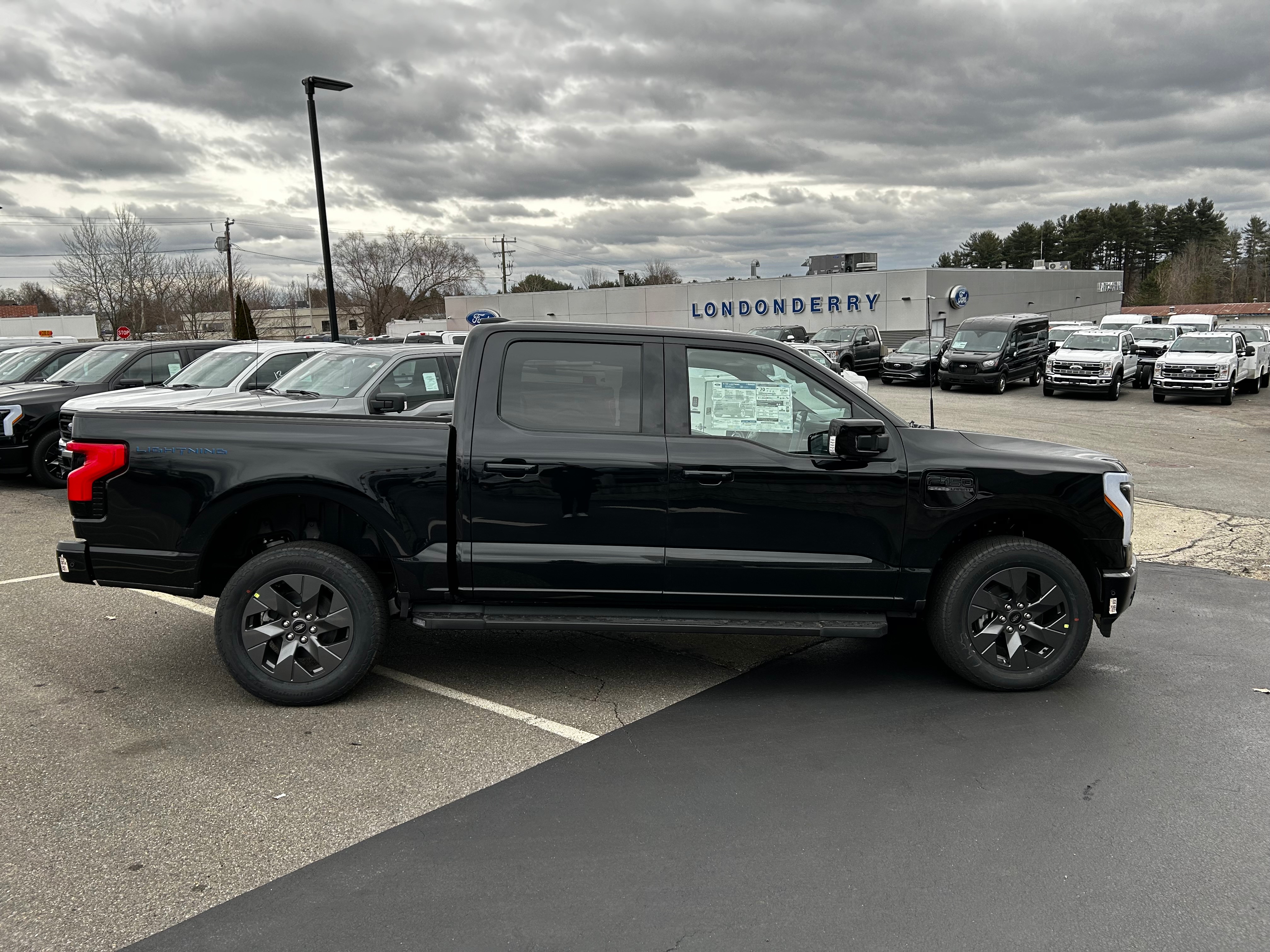Used 2023 Ford F-150 Lightning Platinum with VIN 1FT6W1EVXPWG27699 for sale in Londonderry, NH