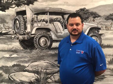 Staff member Trent Russell from 6a562e851325