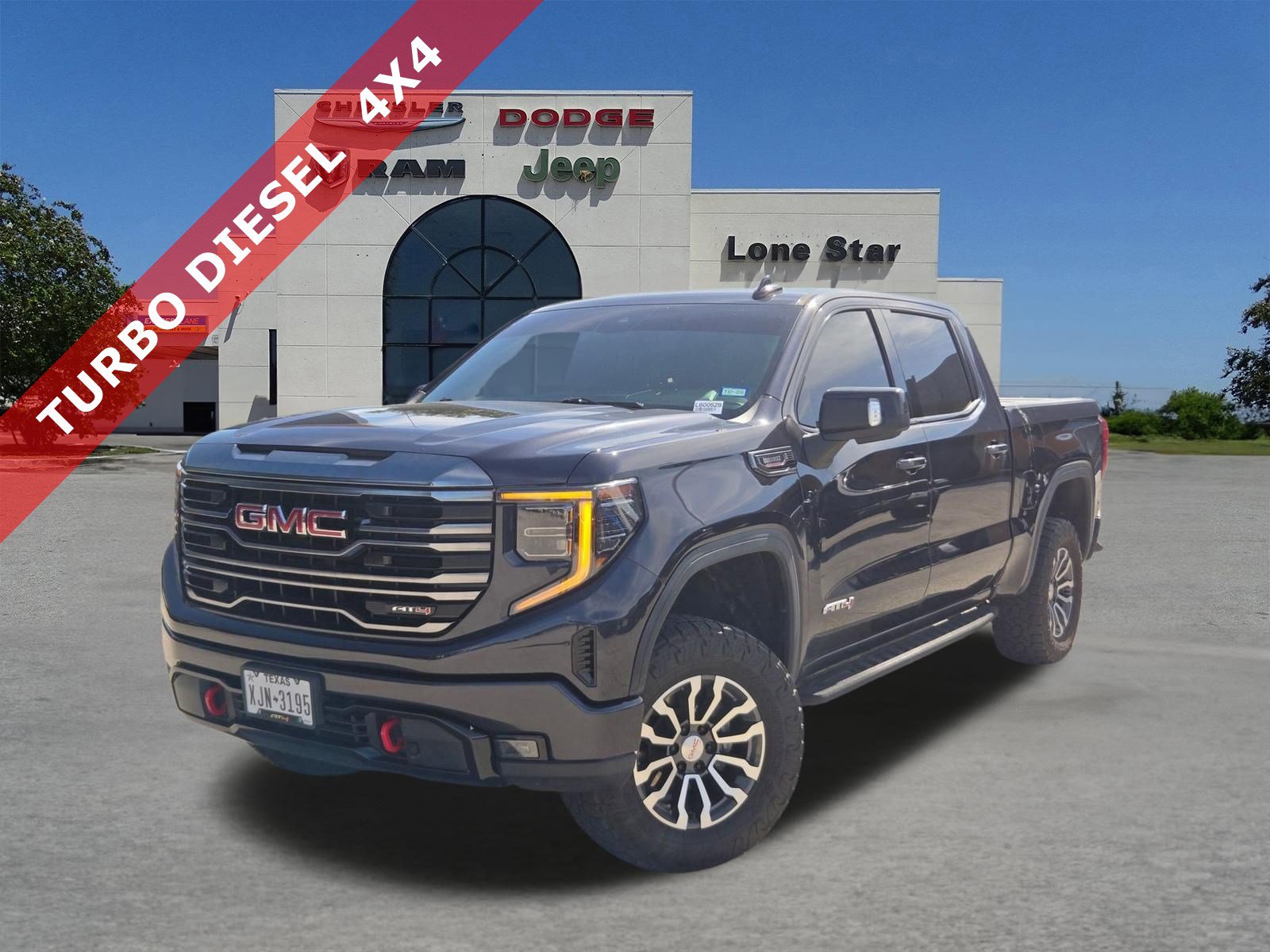 2022 GMC Sierra 4WD Crew Cab Short Box AT4's photo