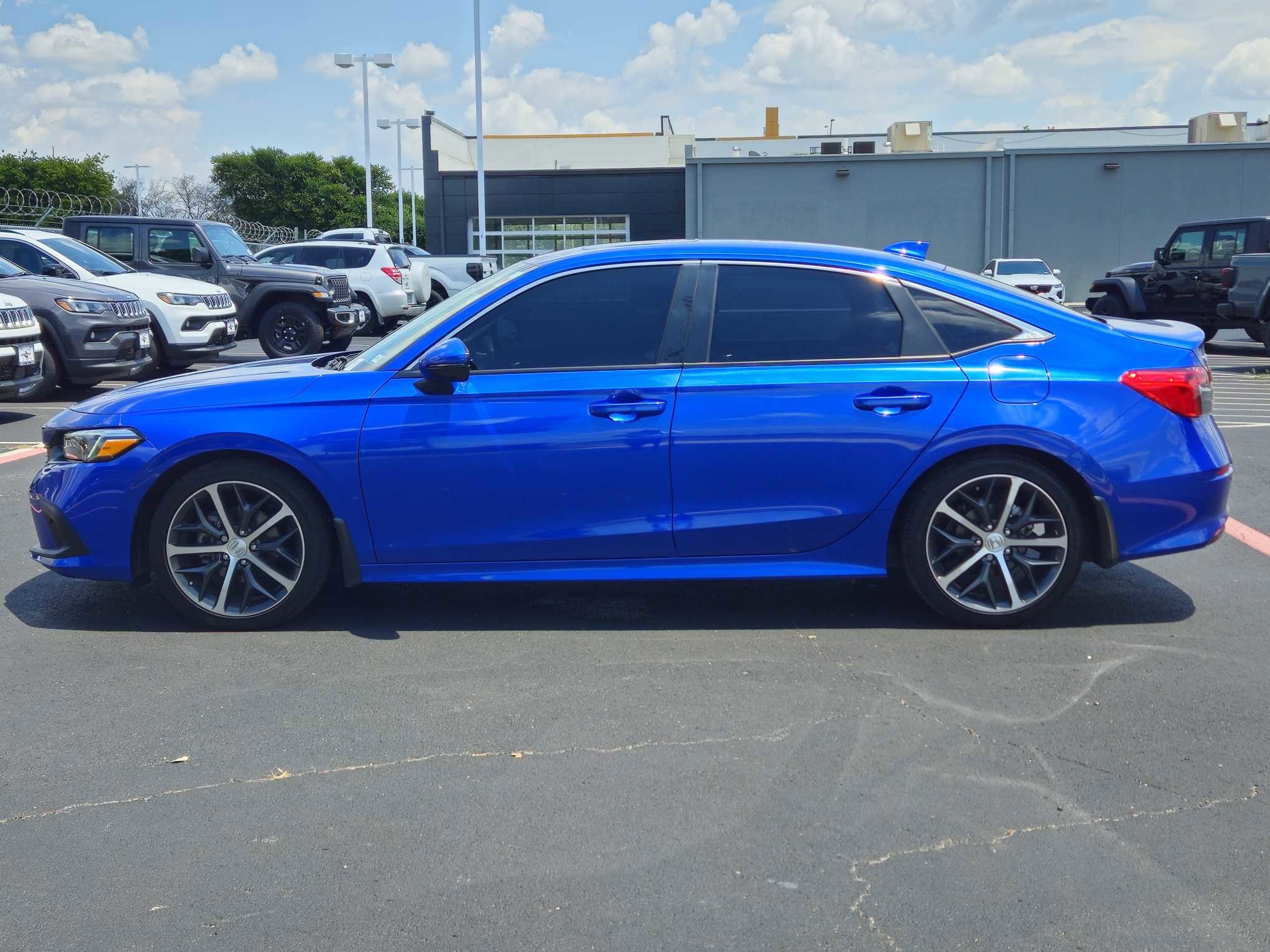 Used 2024 Honda Civic Touring with VIN 2HGFE1F98RH301293 for sale in San Antonio, TX