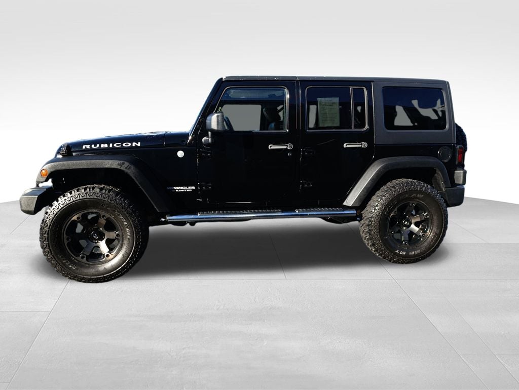 Used 2011 Jeep Wrangler Unlimited Rubicon with VIN 1J4HA6H18BL505814 for sale in Cullman, AL