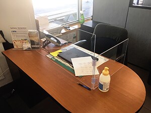 Long Subaru Sale desks with safe shield and sanitizer