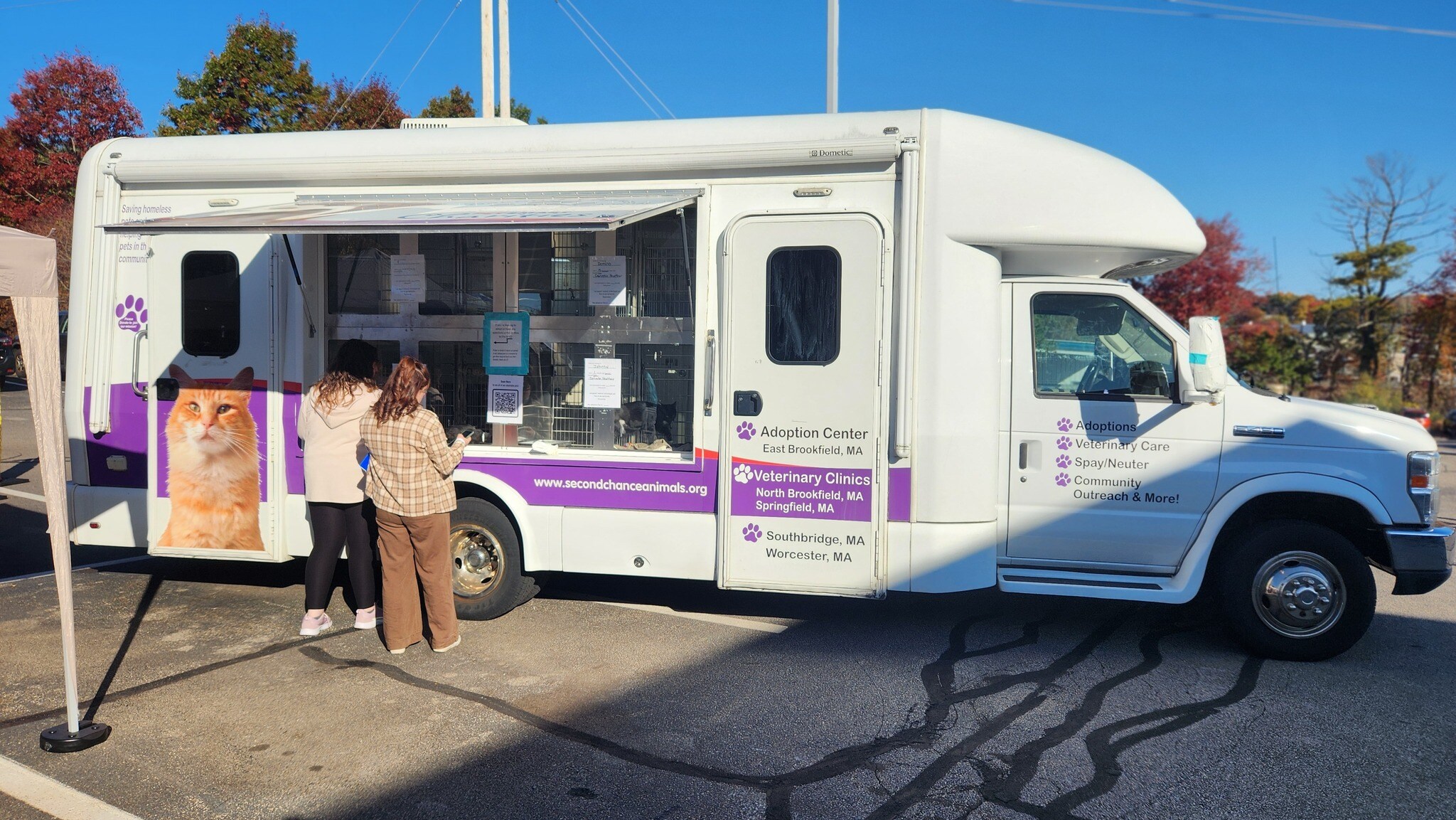 Second Chance mobile adoption van parked outside of Long Subaru
