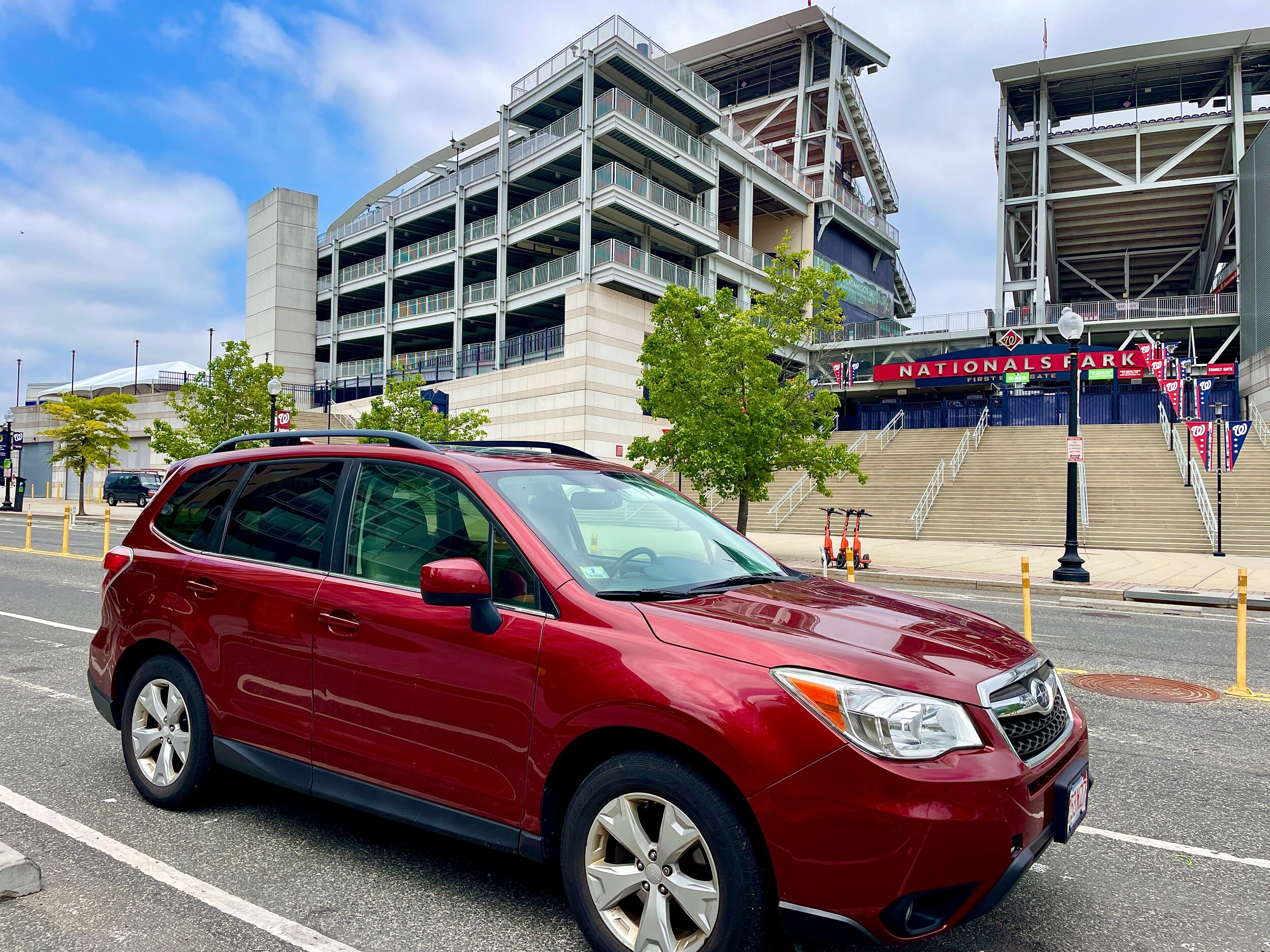 A red forester from Long Subaru parked out front of the Washington Nationals MLB stadium